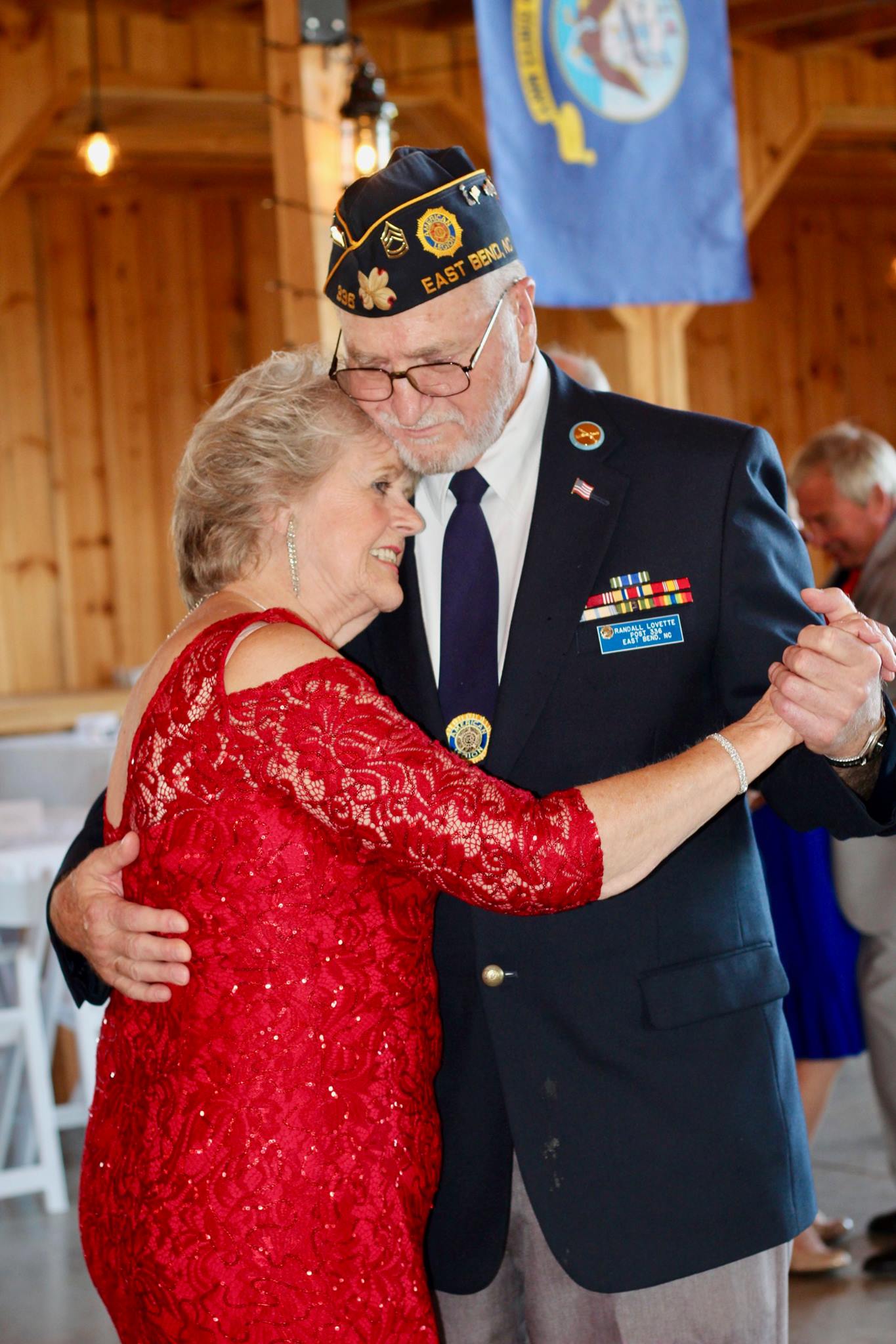 Veteran and wife dancing at celebration
